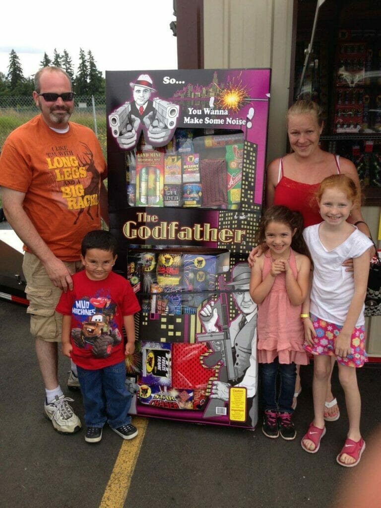 Family buying fireworks
